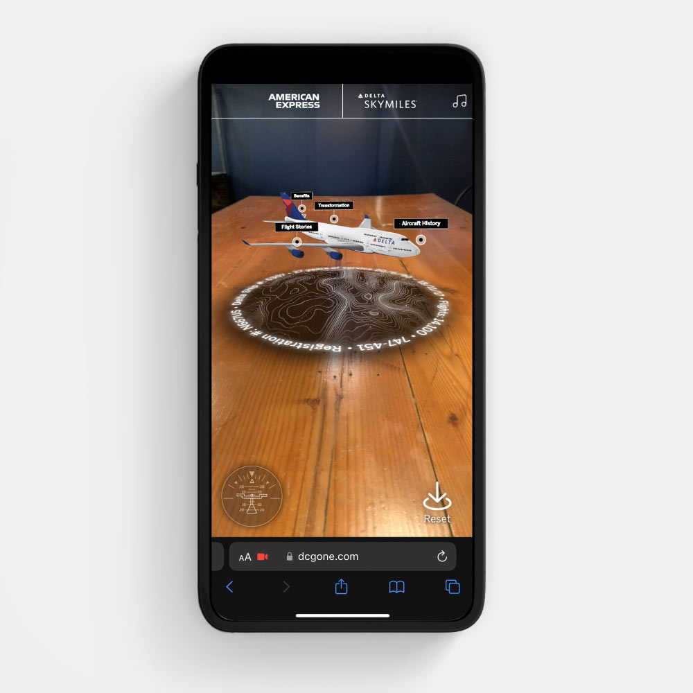 A 3D plane hovers over a black topographical map, with small black labels inviting users to click on different areas of interest.